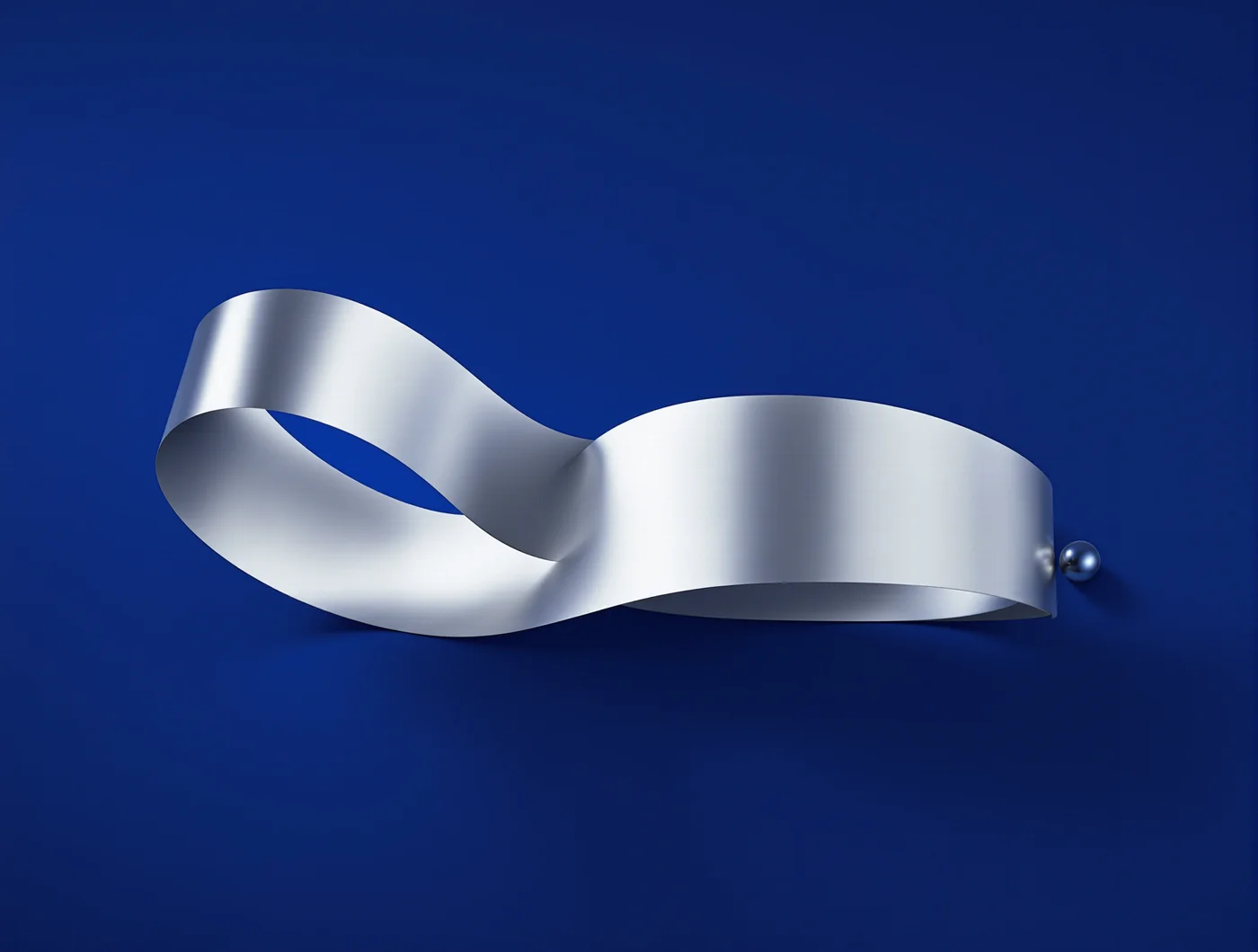 A continuous silver ribbon folded into a flowing loop